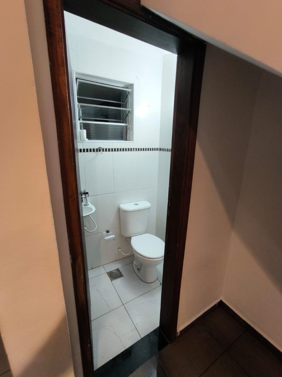 Casa 2 dormitórios à venda com área pra churrasqueira com garagem em São Vicente SP