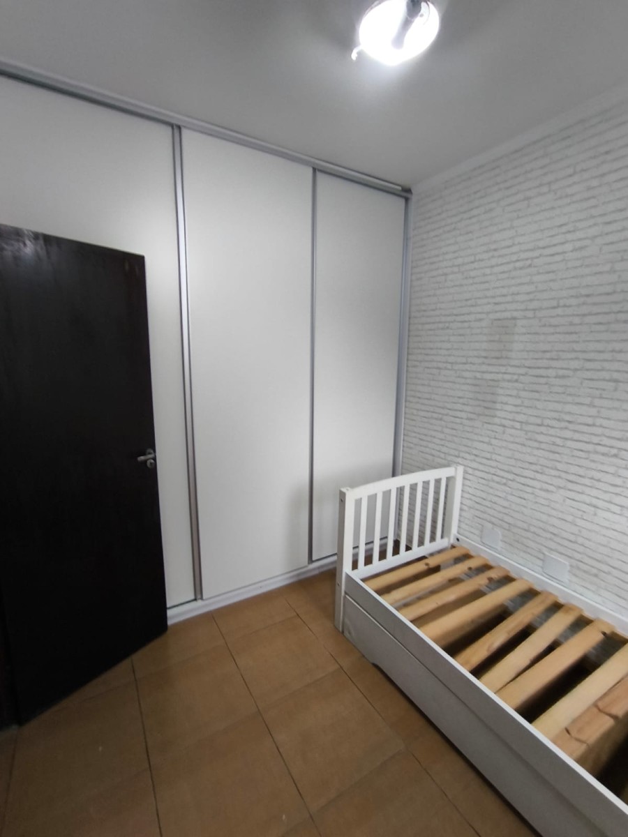 Casa 2 dormitórios à venda com área pra churrasqueira com garagem em São Vicente SP