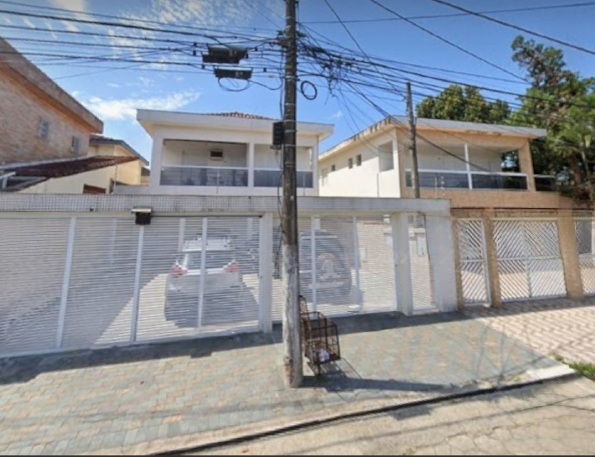 Casa 2 dormitórios à venda com área pra churrasqueira com garagem em São Vicente SP