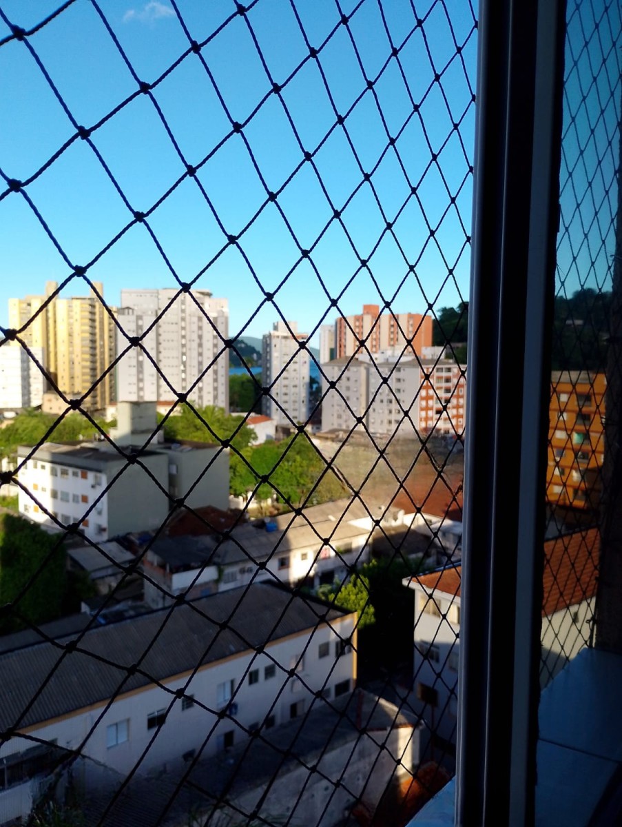 Apartamento à venda de 1 dormitório com garagem em São Vicente SP