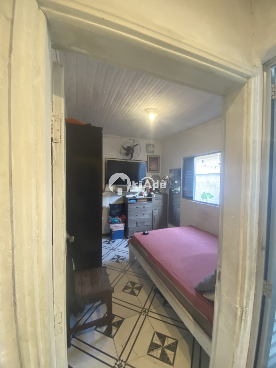Casa à Venda em São Vicente com 3 Quartos, Edícula, Quintal e 3 Vagas no Bitaru