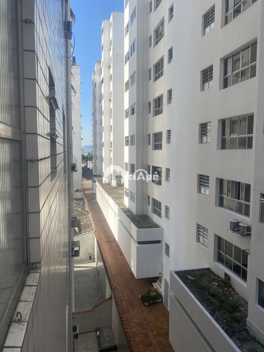 Apartamento à Venda Tipo Sala Living no Gonzaguinha, 1 Quadra da Praia | Em Frente ao Shopping Brisamar | São Vicente-SP